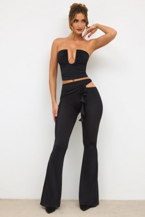 Black Oh Polly Angelika Petite Premium Jersey Rose Detail Mid-Rise Flare Trousers | SDPK-83596