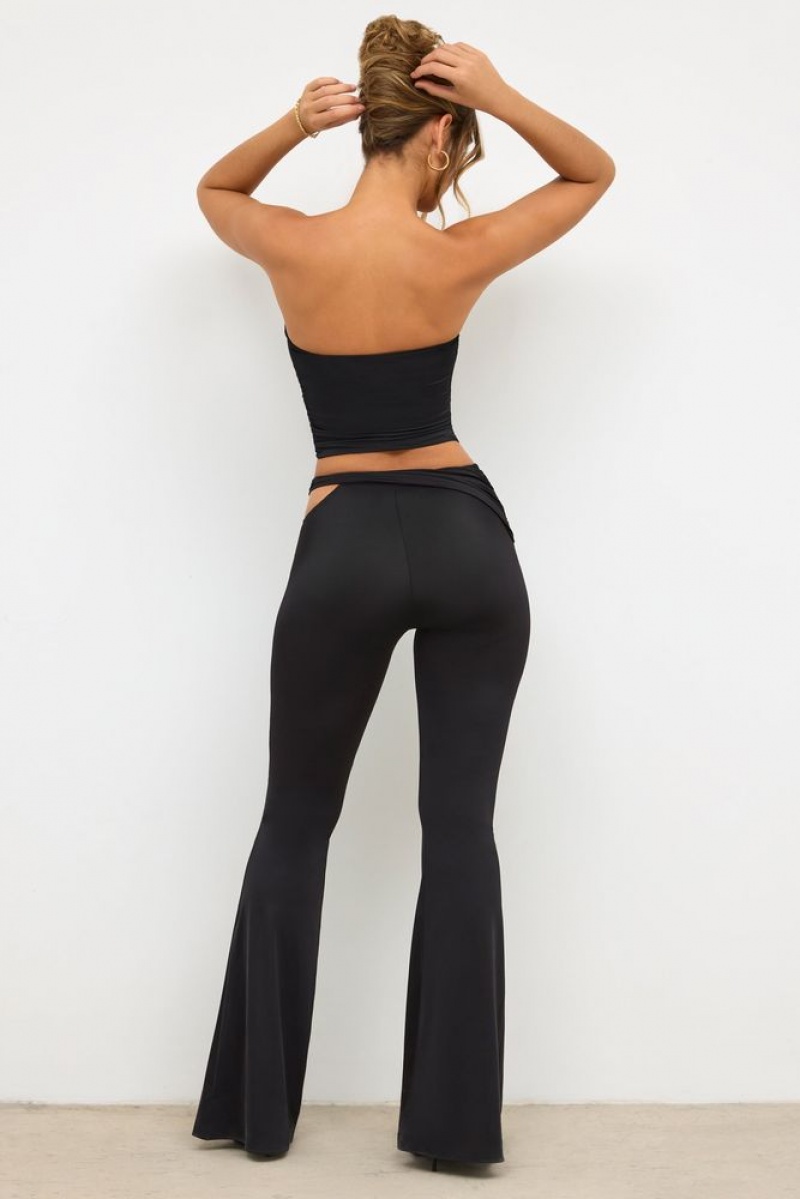 Black Oh Polly Angelika Petite Premium Jersey Rose Detail Mid-Rise Flare Trousers | SDPK-83596