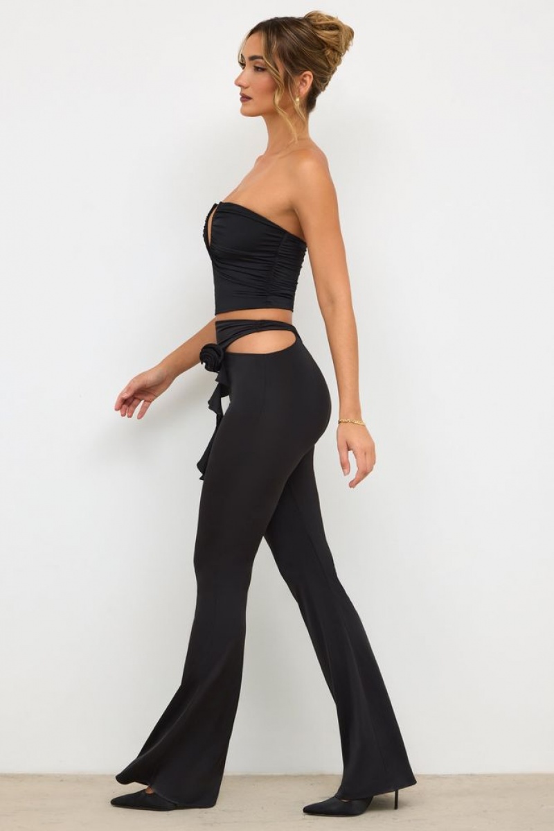 Black Oh Polly Angelika Petite Premium Jersey Rose Detail Mid-Rise Flare Trousers | SDPK-83596