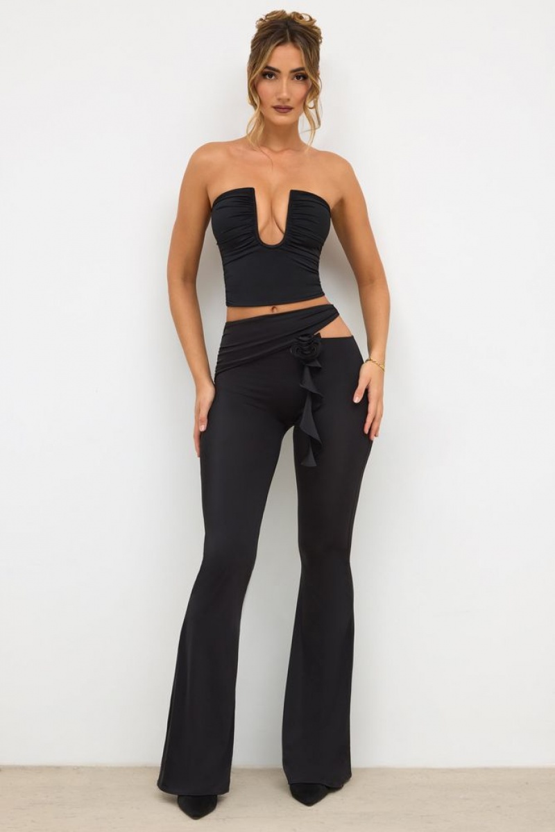 Black Oh Polly Angelika Petite Premium Jersey Rose Detail Mid-Rise Flare Trousers | SDPK-83596