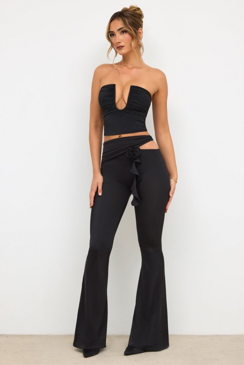 Black Oh Polly Angelika Petite Premium Jersey Rose Detail Mid-Rise Flare Trousers | SDPK-83596