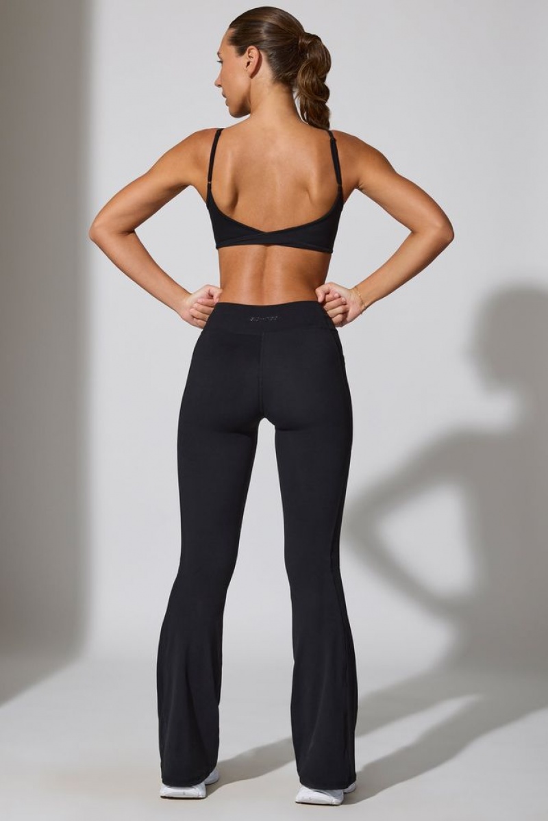 Black Oh Polly Realign Petite Twist Waist Flare Leggings | CFKL-30928