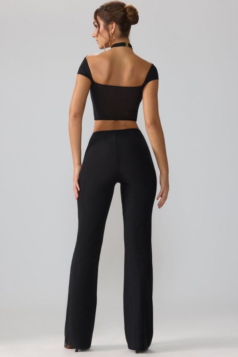 Black Oh Polly Ridley Petite Mesh Mid Rise Twist Overlay Flare Trousers | BRSA-50283