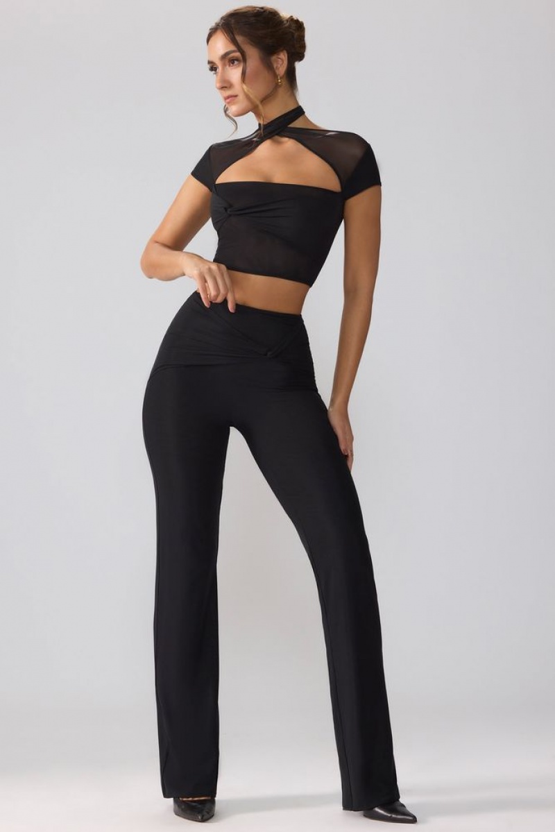 Black Oh Polly Ridley Petite Mesh Mid Rise Twist Overlay Flare Trousers | BRSA-50283