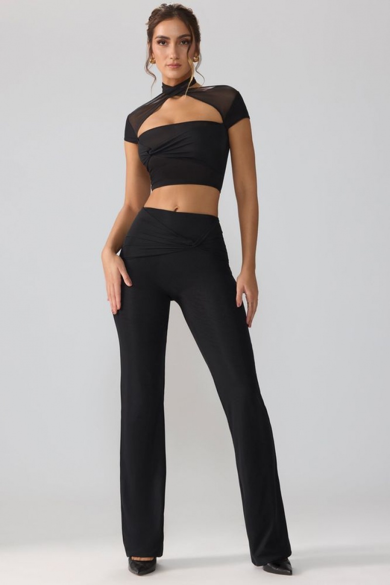 Black Oh Polly Ridley Petite Mesh Mid Rise Twist Overlay Flare Trousers | BRSA-50283