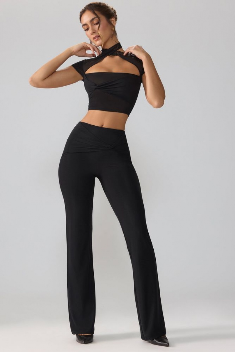 Black Oh Polly Ridley Petite Mesh Mid Rise Twist Overlay Flare Trousers | BRSA-50283